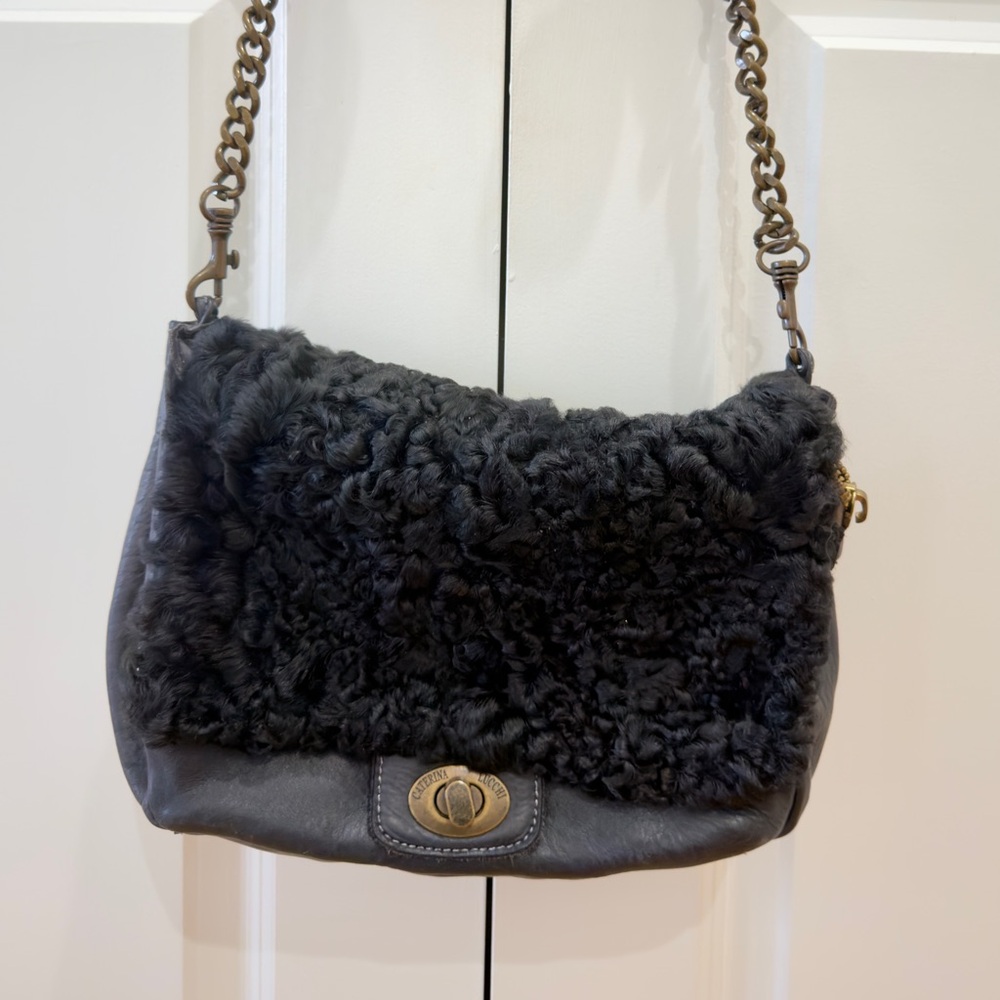 Elegant Black Shearling Shoulder Bag CATERINA LUCCHI
Leather handbag